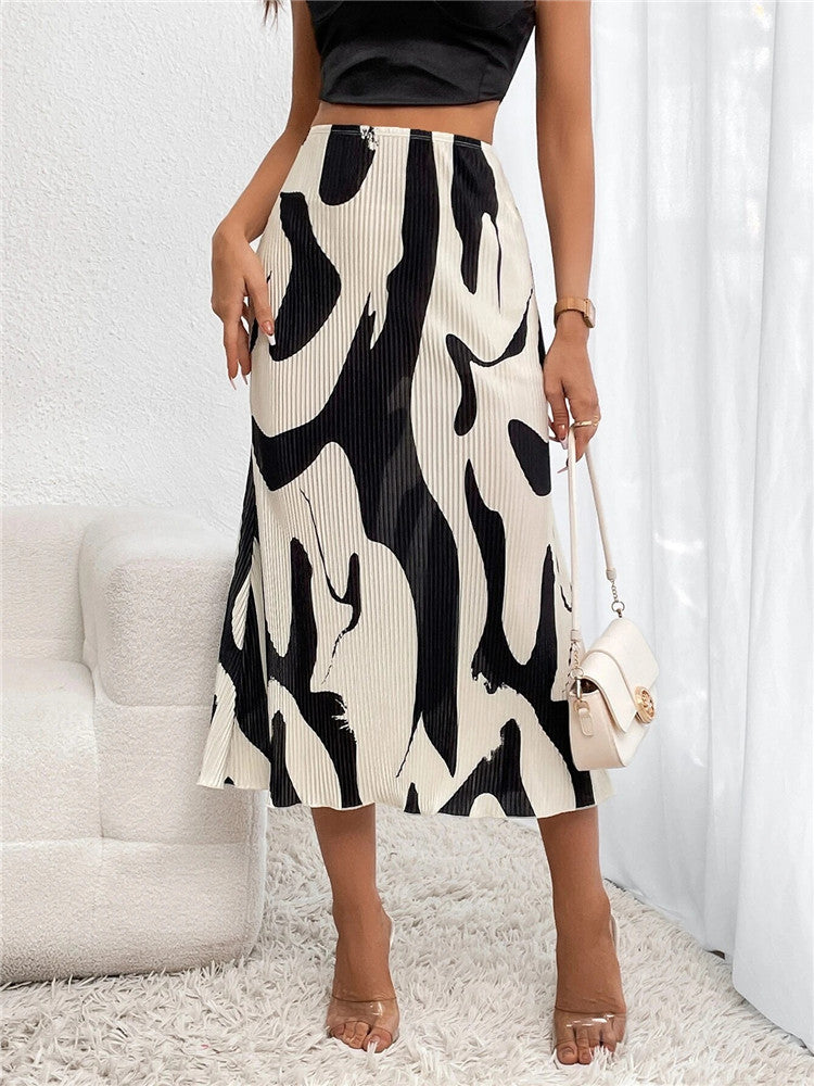 Eleganter Rock mit fließenden Falten, perfekt für einen raffinierten und femininen Look, geeignet für jede Gelegenheit