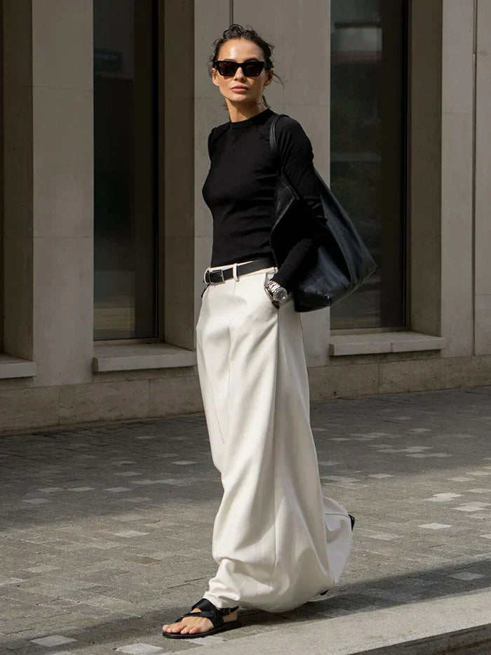 Eleganter Rock in H-Form mit einfachem und raffiniertem Design, perfekt für einen klassischen und raffinierten Look