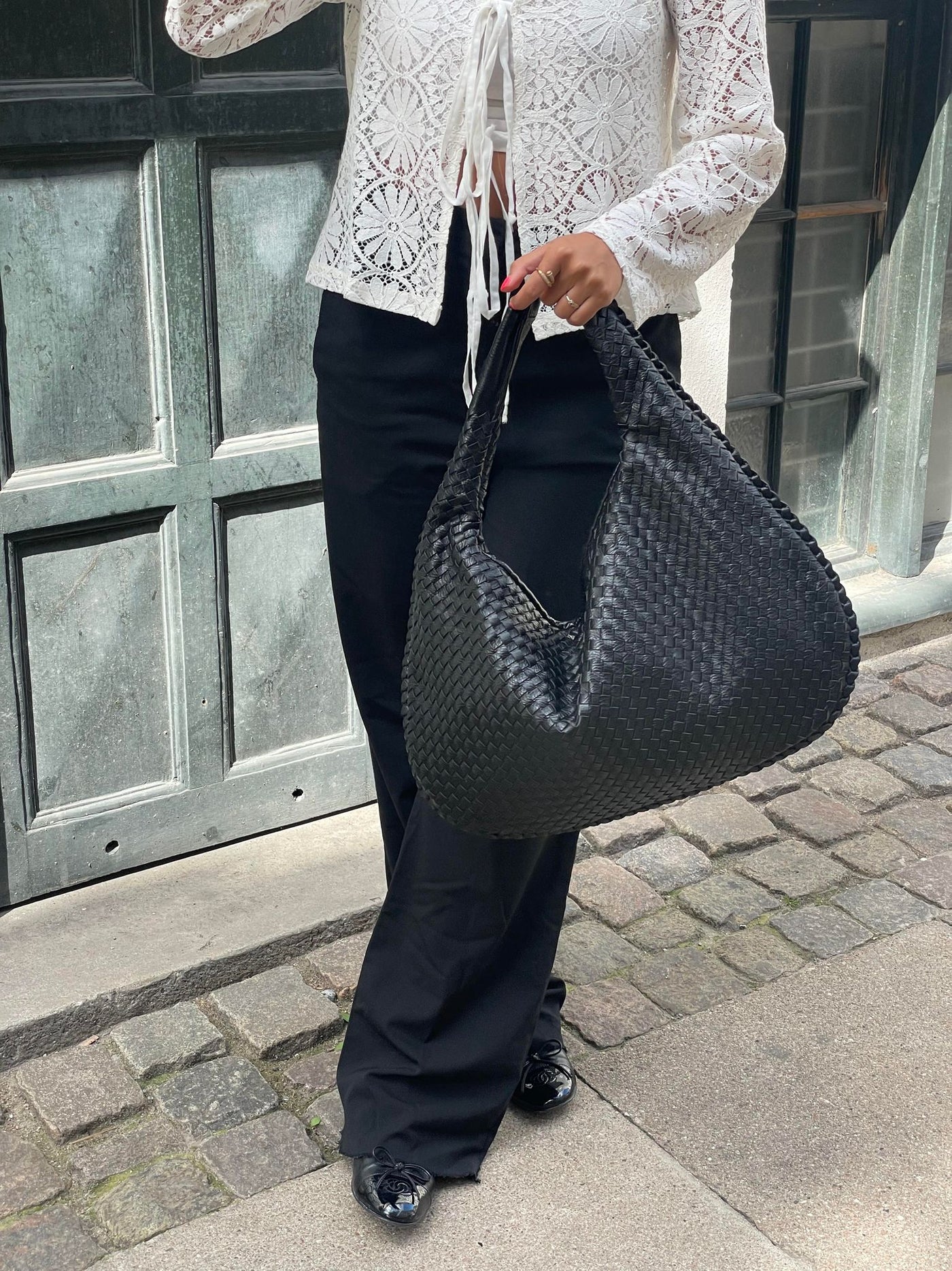 Trendige geflochtene Tasche