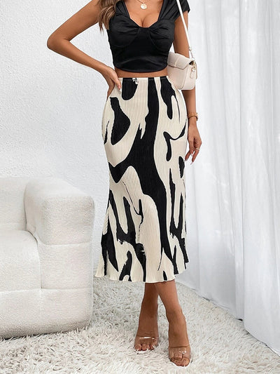 Eleganter Rock mit fließenden Falten, perfekt für einen raffinierten und femininen Look, geeignet für jede Gelegenheit