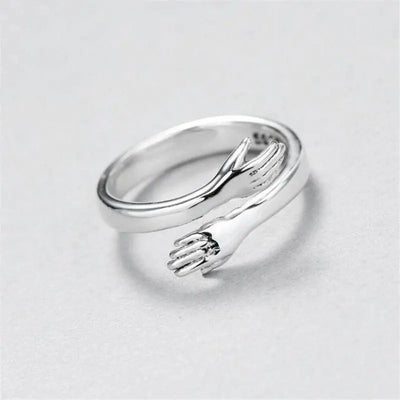 Verstellbarer Silberring mit Umarmungsdesign