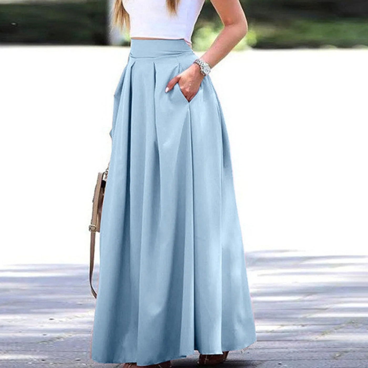 Eleganter und fließender Faltenrock mit hoher Taille, ideal für einen raffinierten und femininen Look