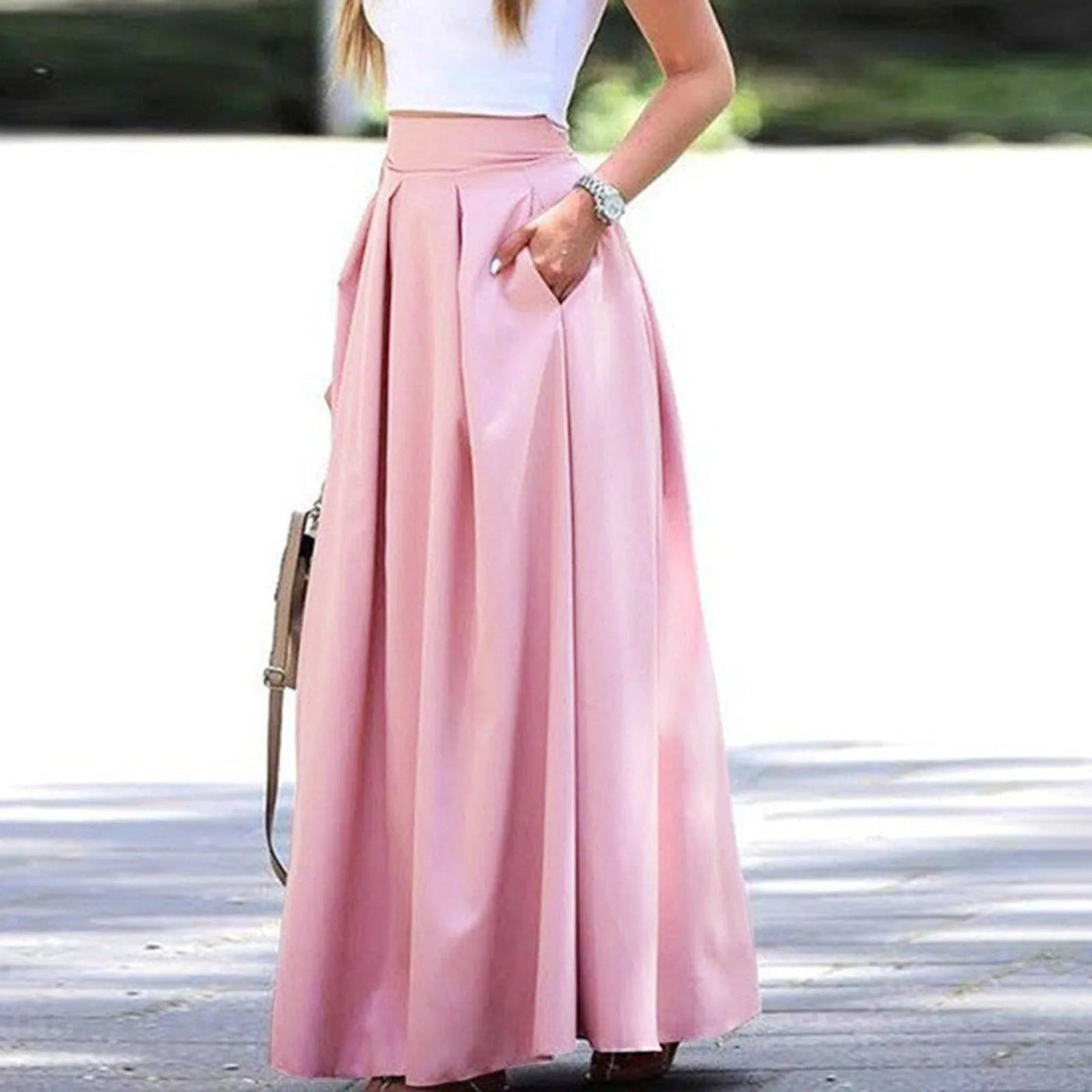 Eleganter und fließender Faltenrock mit hoher Taille, ideal für einen raffinierten und femininen Look