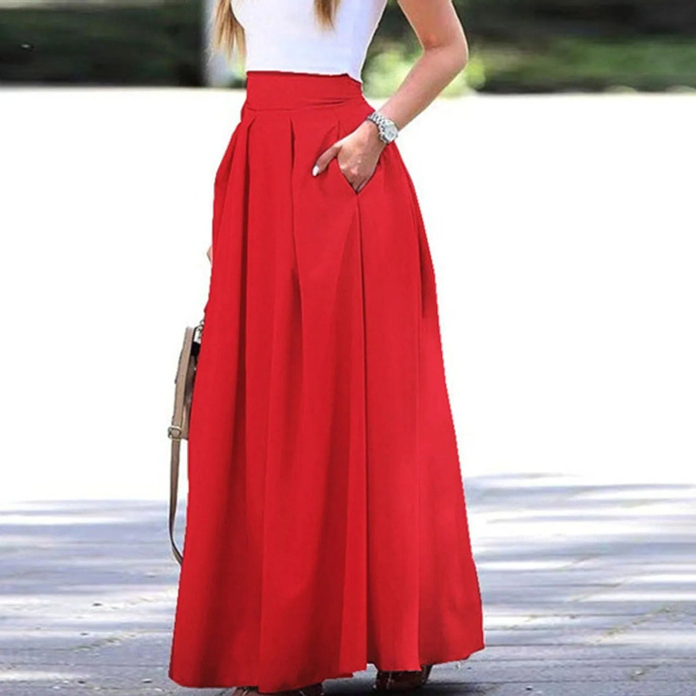 Eleganter und fließender Faltenrock mit hoher Taille, ideal für einen raffinierten und femininen Look