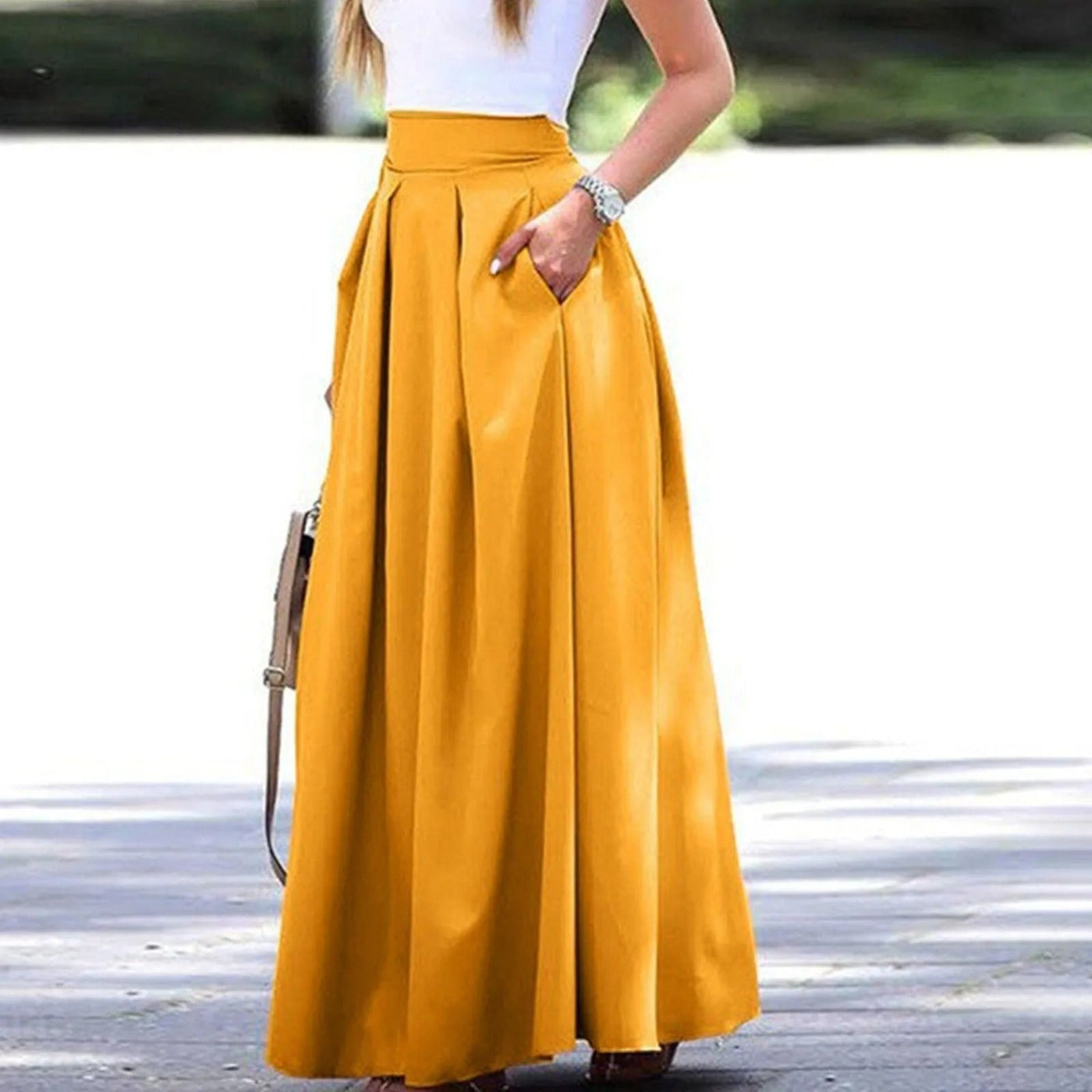 Eleganter und fließender Faltenrock mit hoher Taille, ideal für einen raffinierten und femininen Look